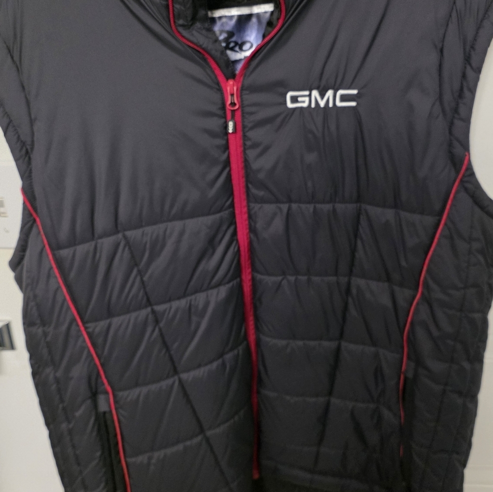GMC Black Puffer Vest With Red Accents.